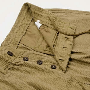 Universal WorksCotton Seersucker Pleated Track Short - Olive 8 Universal WorksCotton Seersucker Pleated Track Short - Olive - Image 7